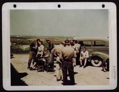 Thumbnail for ␀ > Italy.....Red Cross Worker Marguerite Long Serves Coffee And Doughnuts To P-47 Pilots Of The 15Th Air Force.