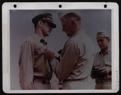 Thumbnail for ␀ > North Africa - 1/Lt. Lawrence P. Liebers Of Burbank, California Receiving The Distinguished Flying Cross From Lt. Gen. Carl A. Spaatz.