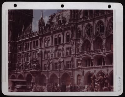 Thumbnail for ␀ > Munich, Birthplace Of The Nazi Party.  The Munich City Hall Which Now Houses The Allied Military Government Was Built By Kaiser Wilhelm In 1910.  In The Foreground Is An American Jeep With Gi'S Photographing The Town.