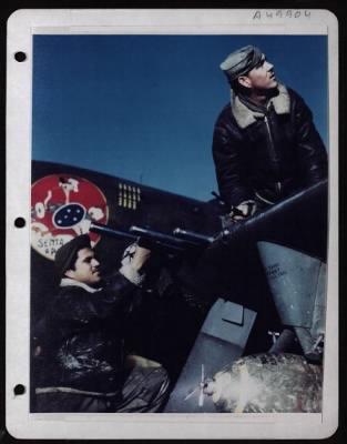 Thumbnail for ␀ > Pfc. Luiz Delmar F. Lima And Pfc. Aldris Agostini Do Costa Of The Lst Brazilian Fighter Squadron Clean Guns On A P-47 Thunderbolt.  Italy.