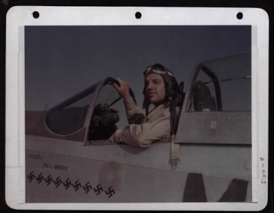 Thumbnail for ␀ > Major Sam J. Brown In The Cockpit Of His P-51 Somewhere In Italy.