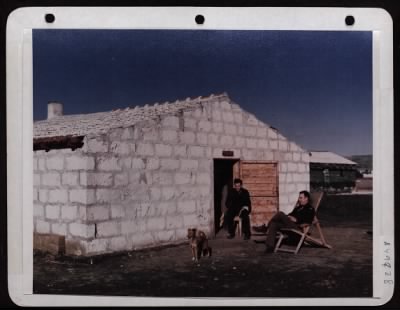 Thumbnail for ␀ > Lt. Mm. Rosenberg And Lt. Gene Simon In Front Of Their Stone House At A 15Th Af Base In Italy.