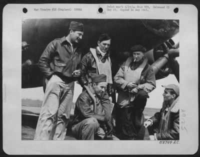 Thumbnail for Consolidated > A Ninth Air Force Bomber Base, England -- Ernie Pyle, Famed War Correspondent, And Four Marauder Gunners Are Discussing A Forthcoming Flight Just Before The Take-Off.  Pyle Spent Several Days At This 9Th Air Force Base, Living With The Men Shown Here And