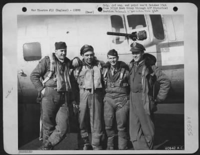 Consolidated > Lead Crew On Bombing Mission To Gelsenkirchen, Germany, In Front Of A Boeing B-17 Flying Fortress.  427Th Bomb Squadron, 303Rd Bomb Group.  England, 22 March 1945.