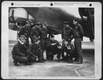 Consolidated > Crew Of The 560Th Bomb Squadron, 388Th Bomb Group, Beside A Boeing B-17 Flying Fortress.  England, 23 March 1944.  Left To Right: T/Sgt. Floyd Huffman, Caldwell, Kansas S/Sgt. Oscar J. Olson, Fort Dodge, Iowa S/Sgt. Owen N. Harned, Edinboro, Penn S/Sgt. H