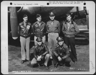 Thumbnail for Consolidated > Operations Staff Of The 326Th Bomb Squadron, 92Nd Bomb Group, Beside A Boeing B-17 Flying Fortress.  England 2 September 1944.  Standing, Left To Right Are: Capt. William Strond; Lt. Alfred E. Johnson; Capt. Ernest Charles Hardin, Jr.; Capt. Erro L. Miche