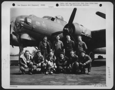 Thumbnail for Consolidated > Capt. Packard And Lead Crew On Bombing Missions To Lyons-Bron Airdrome, France, Beside A Boeing B-17 Flying Fortress, 358Th Bomb Squadron, 303Rd Bomb Group, England.  30 April 1944.