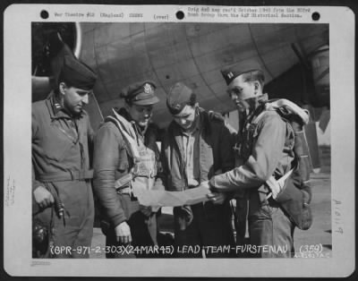 Consolidated > Lead Crew Of Bombing Mission To Furstenau, Germany, In Front Of A Boeing B-17 Flying Fortress.  359Th Bomb Squadron, 303Rd Bomb Group, England.  24 March 1945.