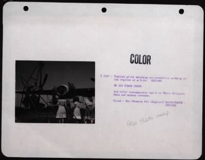 Thumbnail for General > English Girls Watching Air Mechanics Working On The Engines Of A B-24.  England.