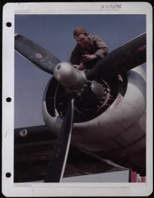 Thumbnail for General > Sgt. Arthur Dwyer, Boston, Mass, Works On Engine Of A Consolidated B-24 Of The 8Th Air Force.