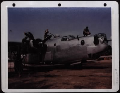 Thumbnail for General > Ground Crew Checking A B-24 After A Mission. England.