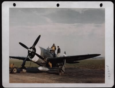 Republic > A Republic P-47 Crew Chief Ssgt Robert H. Mcchord Of Nashville, Assisting Pilot 2Nd Lt. Alvin Juchheim Of Grenada, Miss., Prior To Take Off From An 8Th Air Force Base In England.