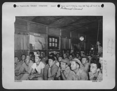 Consolidated > B-26 Marauder crew members of the tactical Air Force, are shown here at a briefing before they took off from their Mediterranean base to fly in support of ground troops that invaded the coast of Southern France, between Toulon and Cannes, on Aug 15