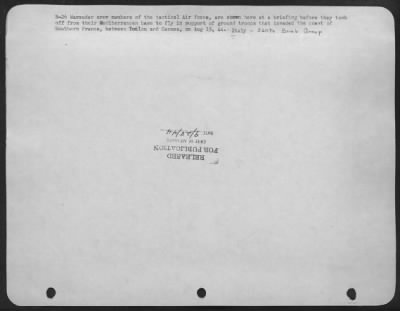 Thumbnail for Consolidated > B-26 Marauder crew members of the tactical Air Force, are shown here at a briefing before they took off from their Mediterranean base to fly in support of ground troops that invaded the coast of Southern France, between Toulon and Cannes, on Aug 15