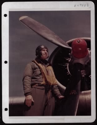 Thumbnail for Bomber > Capt. Charles S. Hudson, Bombardier, Standing By A Plane At A Base In England.