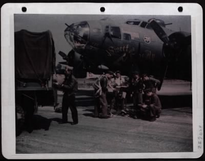 Thumbnail for Bomber > An Air Force Navigator On B-17 'Sweet And Lovely' Tosses Flight Bag On Truck After Mission.  Lt. Bradner Makes Report. Eighth Air Force, England.