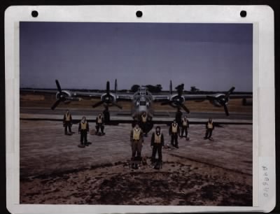 Thumbnail for Bomber > Crew Of A Consolidated B-24 Of The 8Th Air Force At A Base Somewhere In England.  They Are, Front Row, Left To Right: Lt. William C. Rowland, Co-Pilot Of New Castle, Pa., Lady, Cocker Spaniel Mascot; And Capt. Robert V. Whitlow, Pilot Of Hollywood, Calif.