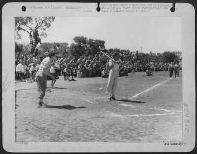 Thumbnail for Consolidated > ARMY NURSES PLAY BASEBALL WITH WACS IN ITALY. It is the first baseball game ever to be played in the Mediterranean Theater between Wacs and Nurses. Some 4,000 GI spectators, members of the Air Service Command and Adriatic Depot