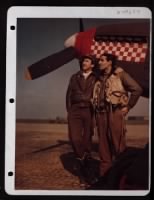 Thumbnail for England....Captain Don S. Gentile (Right) And His Wingman First Lieutenant Godfrey, Stand Beside The Nose Of A P-51 Mustang. - Page 1