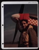 Thumbnail for Close-Up Capt. Don S. Gentile Beside His Plane Somewhere In England. - Page 1