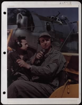 Thumbnail for NAGA Head Hunters > Maintaining Radio Control With Control Tower And Aircraft On The Field, These Men, Cpl. Larry Roth And Cpl. Wallace Merquardt Are Responsible For Directing Planes To Take Off At A Base Somewhere In England.