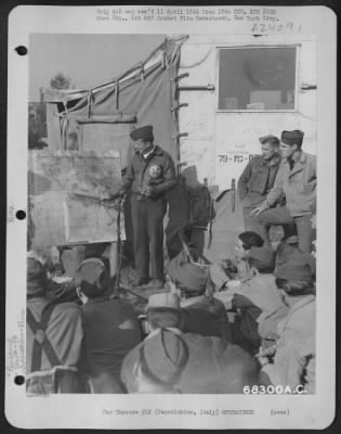 Thumbnail for Consolidated > Capt. Bain, Group Operations Officer Of The 79Th Fighter Group, Explains To Ground Crews, The Reason For Moving From Termoli To Capodichino, Italy.