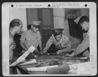 Consolidated > Major General St. Clair Street Studies A Mosaic In The Mosaic Room At An Air Base Somewhere In Italy As A British Officer Looks On.  90Th Photo Reconn Wing.