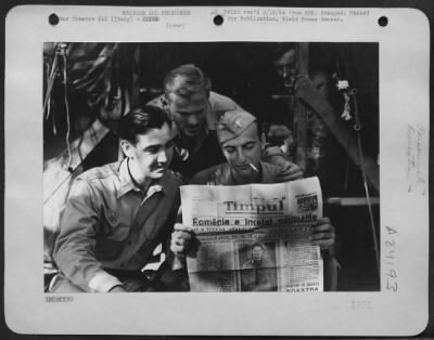 Thumbnail for Consolidated > Lt. Thomas F. Fallon (Left) Of North Billerica, Mass.; Lt. William S. Robbins (Center) Beloit, Wisc., And Lt. J.A. Alvater Of Packanack, Ny, Just Flown From A Rumanian Prison Camp To Italy, Display The Rumanian Newspaper Which Announded The Surrender Of T