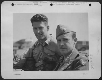 Consolidated > Left, Maj. William Yeager, Helbrowville, Texas, And Maj. C.R. Haas, Redwood City, Calif., Two Of The Airmen Evacuated From Rumanian Prison Camps After Rumania Surrendered On 23 Aug 44.  Over 1,000 American Airmen Were Brought Back To Italy After Rumania'S