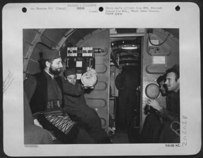 Thumbnail for Consolidated > Left, Front To Rear:  Capt. Charles King, Tucumcari, Nm, And S/Sgt. Gordon B. Tolman, Los Angeles, Calif., Right, Front To Rear, S/Sgt. Thomas M. Connolly, Jr., South Boston, Mass., And S/Sgt. Martin J. Nosal, Groveton, Pa.  Capt. King Is A Lockheed P-38