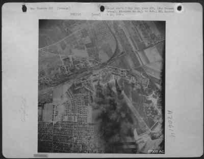 Thumbnail for Consolidated > Taken April 11, 1945 By 1St Lt. Arnett Fraser Tait, 505 N. Division St., Ann Arbor, Mi, Photo Shows A Luftwaffe Base On The Outskirts Of Leipzig-Mockau Burning After An Attack By Bomb-Laden 9Th Af Lockheed P-38 Lightning Fighter-Bombers.