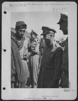 Thumbnail for Consolidated > Left To Right: 2Nd Lt. Theodore F. Hastings (Holding Medal) Of 15 Washington Place, Wallington, Nj, Talking With Major General Nathan F. Twining And Gen. C.F. Born.  Lt. Hastings Just Landed At A 15Th Air Force Base In Italy From An Internment Camp In Rum