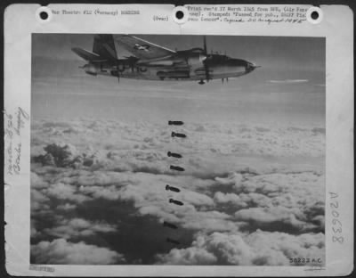 Thumbnail for Consolidated > Bombing With The Aid Of Instruments, A 9Th Af Martin B-26 Marauder Bombardier Releases Eight 500 Pound Bombs Thru Heavy Cloud Cover During An Attack On A German Railroad Yard.  Marauders, Havocs And Invaders Of The 9Th Bombardment Division, Often Searchin