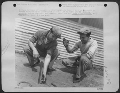 Thumbnail for Consolidated > During A Fast Game Of Horseshoes A Close Decision Is Bound To Come Up.  Especially Do Tempers Flare During The Sweating-Out Session.  Left To Right: Cpl. Guido S. Faitella, 554 New Park Ave., West Hartford, Conn.; And Cpl. James D. Sullenbarger, Rt. 2, Ne