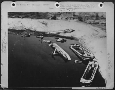 Thumbnail for Consolidated > Barges Sunk -- These Barges Have Sunk In A Turn Around In The Wesel Area When The 1St Allied Airborne Army Dropped March 24Th 1945.  This Picture Was Made From A Consolidated B-24 Liberator, One Of The Force Of 240 Us 8Th Af 2Nd Air Division Bombers That