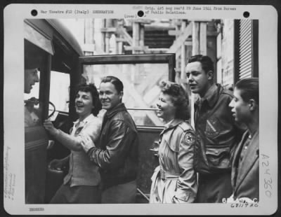 Thumbnail for Consolidated > Two American Red Cross Girls Join 20 War-Weary Youths Of The 15Th Army Air Force On Tour Of The Famous Grottoes Along The Italian Seacoast.  Here, Left To Right: Miss Tilly Jane Reed Of Pittsburgh, Penn., Escorted By Sgt. Percy Johnson, Airplane Engine Me