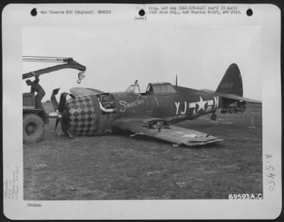 Thumbnail for Consolidated > A Wrecker Makes Ready To Haul The Republic P-47 'Smoocher' (A/C 325572) Of The 353Rd Fighter Group Which Belly Landed Near Its Base In England.  13 August 1944.