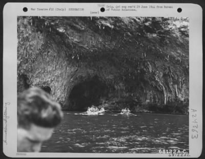 Consolidated > Three Boats Carrying 20 War-Weary Youths Of The 15Th Army Air Force And 2 American Red Cross Girls Leave The Largest Grotto During Their Tour Of The Famous Subterranean Caves Along The Italian Seacoast.