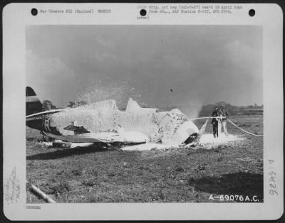 Thumbnail for Consolidated > Fire Fighters Of The 353Rd Fighter Group Make A Successful Attempt To Extinguish The Fire Of A Burning Republic P-47 (A/C 42-7985) Which Crashed At Their Base In England On 19 September 1943.