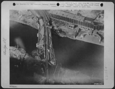 Thumbnail for Consolidated > Bad Munster Railway Bridge, Showing The Results Of Medium Bombardment.  Note Single Track (Temporarily Constructed) In An Attempt To Route Traffic Thru Important Communications Center At At Bad Kreuznack Destroyed 1 Feb 1945.