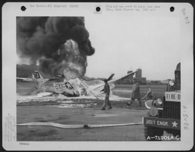 Thumbnail for Consolidated > Fire Fighers Battle The Blaze Of The Burning North American P-51 (A/C 44-14034) Of The 364Th Fighter Group, 67Th Fighter Wing, Which Crashed At The 8Th Air Force Station F-375, Honnington, England.  30 July 1944.