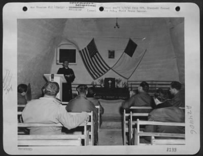 Thumbnail for Consolidated > Capt. James C. Whitley From Indianapolis, Ind., Assistant Chaplain In The Chapel At 'Rocka Fella Center' Officiates At A Mid-Week Services.  Services In Every Denomination Are Conducted In The Chapel.  Italy.