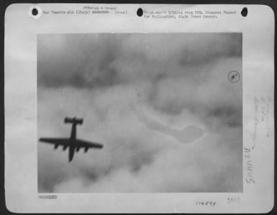 Thumbnail for Consolidated > This Striking Aerial Photograph Was Snapped By An Alert Combat Crew Cameraman, Sgt. Max Shapoff, Of New York City, As One Of The 15Th Aaf Consolidated B-24 Liberators Crashed Somewhere In German-Held Territory.  The Ship, Hit By Flak, Is In A Steep Spiral