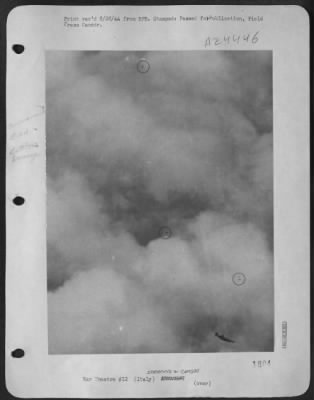 Thumbnail for Consolidated > This Striking Aerial Photo Was Snapped By An Alert Combat Crew Cameraman Sgt. Max Shapoff Of New York City As One Of The 15Th Aaf Consolidated B-24 Liberators Crashed Somewhere In German-Held Territory.  The Ship Was Hit By Flak.  Note The Three Parachute