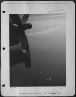 Thumbnail for Consolidated > During An Attack On The Oil Refinery At Porto Marghera, Italy, By Boeing B-17 Flying Fortresses Of The 15Th Air Force On 19 May 1944, This Photo Was Taken Of One Of The 'Forts' With A 'Feathered' Prop.