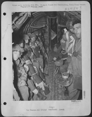 Thumbnail for Consolidated > Italy - In Their Places, And Calm But Grim, These British Paratroopers Were Flown To Greece By The 51St Troop Carrier Wing, 12Th Air Force, Usaaf.  The 51St Also Towed Gliders From Italy To Greece Loaded With British Infantry.