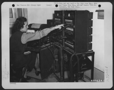 Consolidated > Many Of The 12Th Air Force Vital Communications Are Received And Transmitted By Teletype Machines; Here, T/5 Adelaide Ward Of Norfolk, Virginia, A Member Of A Wac Platoon, Is At Work At The Tele-Type Switchboard.  Italy.