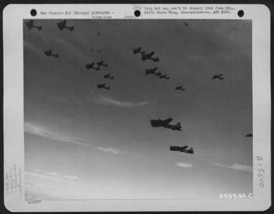 Thumbnail for Consolidated > Lockheed P-38 Lightnings Dart In And Out Of A Large Formation Of 381St Bomb Group Boeing B-17 Flying Fortresses En Route To Bomb Enemy Installations In Europe.