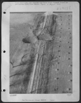 Thumbnail for Consolidated > Spaghetti Line -- The Name Give This Much-Bombed Railroad In Northern Italy By 12Th Air Force Republic P-47 Thunderbolt Pilots.  Twin Bombs From The Wings Of P-47 Accomplished A New Twist Here, Coiling The Heavy Steel Railing Into The Shape Of A Spring.