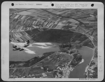 Thumbnail for Consolidated > This Is The Attack - A Lone Martin B-26 Marauder Breaks Away From The Ostiglia Bridge Target As Smoke Rises From A String Of Bombs Walking Across The Enemy'S Last Link Over The Po River Between Germany And The Front Lines In Northern Italy.  The Germans H